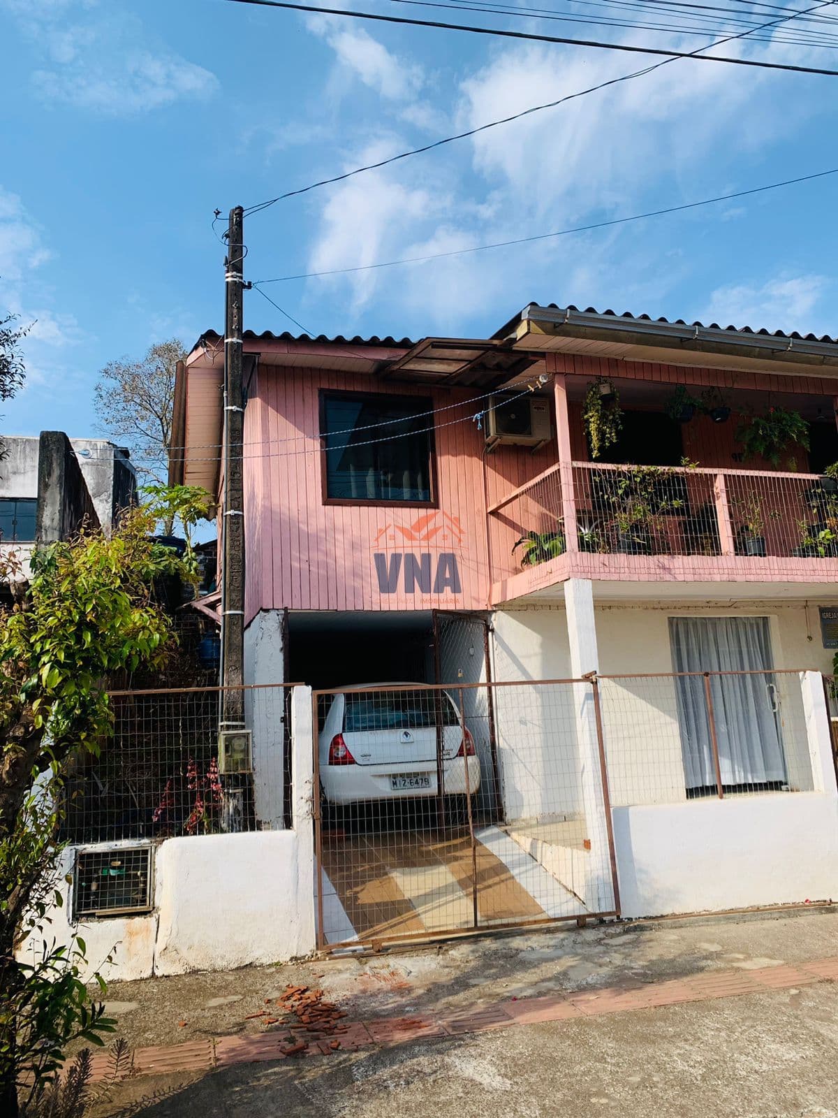 TERRENO com casa a venda no Centro de Pinhalzinho/SC